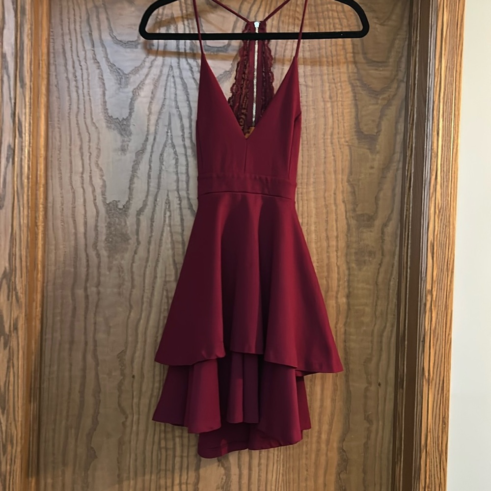 HOMECOMING SEASON
Windsor halter dress, cranberry color, size small.